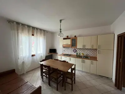 Cucina o angolo cottura di Flexible 6-Person Stay in Rosolina Mare