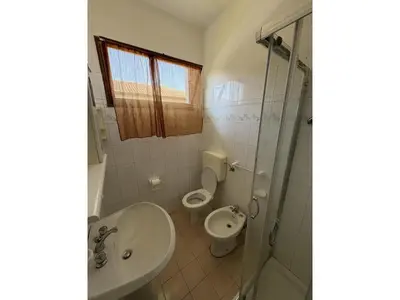 Bagno di Small apartment house with balcony