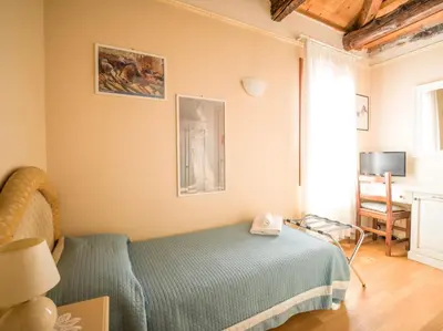Letto o letti in una camera di Ca' dei Fuseri