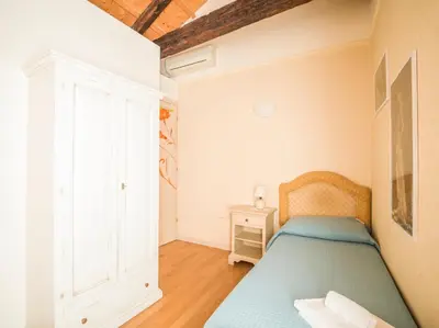 Letto o letti in una camera di Ca' dei Fuseri
