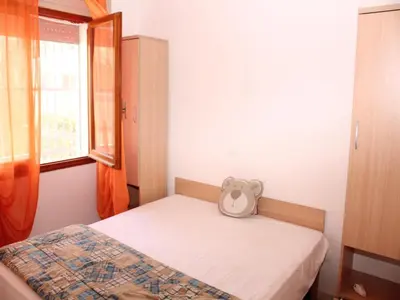 Letto o letti in una camera di Beachside Villa For a Family