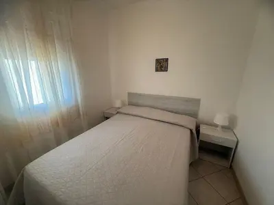 Letto o letti in una camera di Beachside Villa For a Family