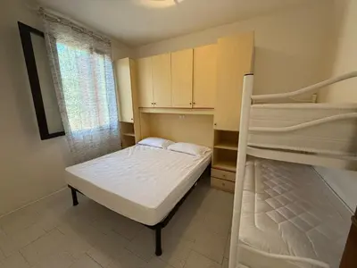 Letto o letti in una camera di Rosolina Mare Apartment near Beach