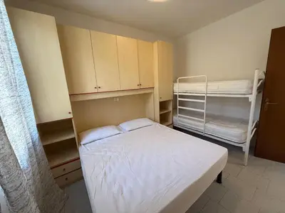 Letto o letti in una camera di Rosolina Mare Apartment near Beach