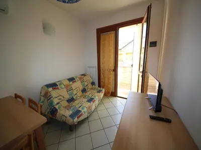 Area soggiorno di Family stay in Rosolina for six guests