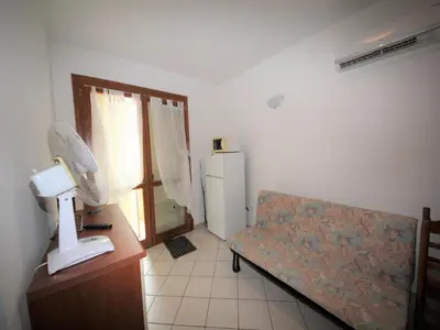 Letto o letti in una camera di Family stay in Rosolina for six guests