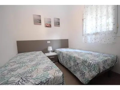 Letto o letti in una camera di Rosolina apartment near the beach