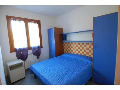 Letto o letti in una camera di Two bedroom Rosolina apartment with space