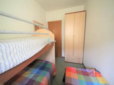 Letto o letti in una camera di Family stay in Rosolina Mare near sea