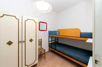 Letto o letti in una camera di Residence Pineta