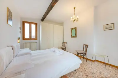 Letto o letti in una camera di Casa Flavia