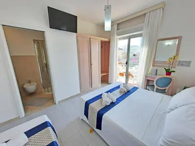 Letto o letti in una camera di Hotel Margherita