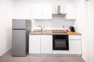 Cucina o angolo cottura di Residence Domus 1 - Treviso Family Suites