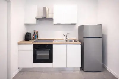 Cucina o angolo cottura di Residence Domus 1 - Treviso Family Suites