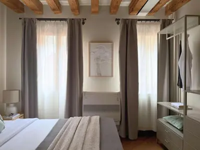 Letto o letti in una camera di Corte Contarina Luxury Apartment San Marco Venice