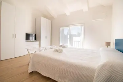 Letto o letti in una camera di Appartamento Palladio residence Pergoletta