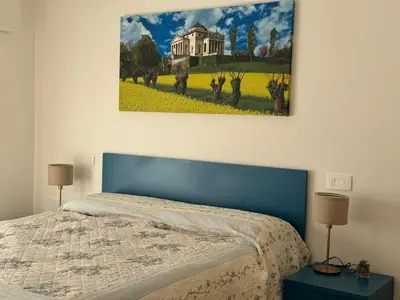 Letto o letti in una camera di Appartamento Palladio residence Pergoletta