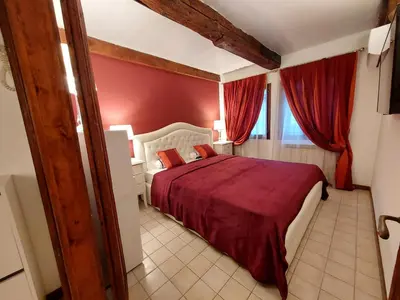 Letto o letti in una camera di Rialto Penthouse
