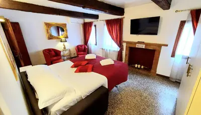 Letto o letti in una camera di Rialto Penthouse
