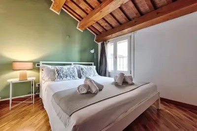 Letto o letti in una camera di Il Mosaico, 3BR,2BA in the Heart of Vicenza