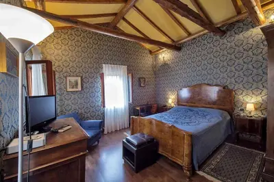 Letto o letti in una camera di Cà Fede