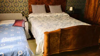 Letto o letti in una camera di Cà Fede