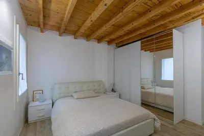 Letto o letti in una camera di Casa Busato - P1