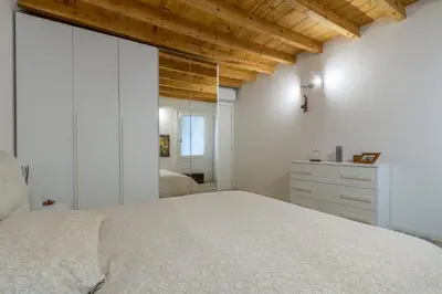 Letto o letti in una camera di Casa Busato - P1