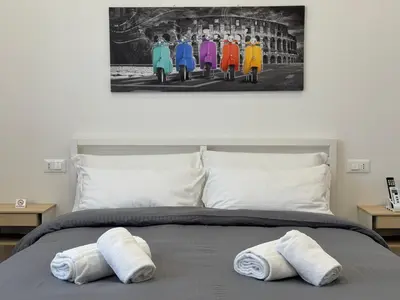 Letto o letti in una camera di OTB ITALIA - Airport Rooms