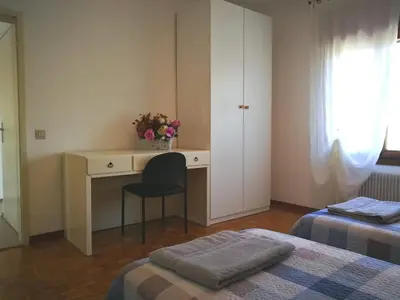 Letto o letti in una camera di Boscaglie sweet home