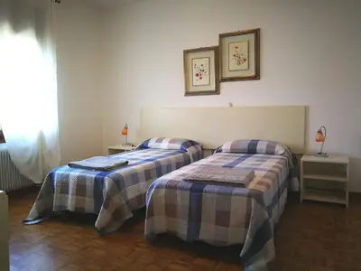 Letto o letti in una camera di Boscaglie sweet home