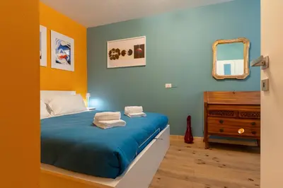 Letto o letti in una camera di Casa Vittoria