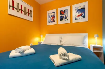 Letto o letti in una camera di Casa Vittoria