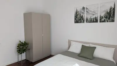 Letto o letti in una camera di Gottardo Apartments