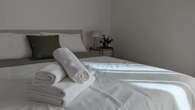 Letto o letti in una camera di Gottardo Apartments