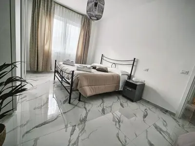 Letto o letti in una camera di Da Ion