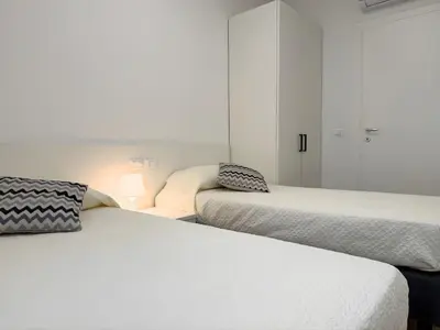 Letto o letti in una camera di Permar - Home immobiliare
