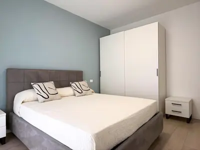 Letto o letti in una camera di Permar - Home immobiliare