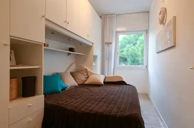 Letto o letti in una camera di Villa Oliva 8 - Carraro Immobiliare - Family Apartments