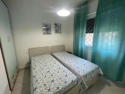 Letto o letti in una camera di Comfortable flat with private garden in Rosolina