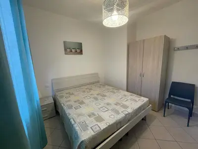 Letto o letti in una camera di Cozy flat at a short distance from Rosolina beach