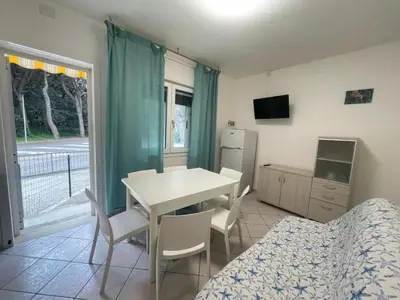 TV o dispositivi per l'intrattenimento presso Cozy flat at a short distance from Rosolina beach