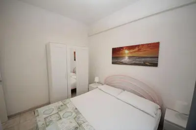 Letto o letti in una camera di Rosolina Mare flat near beach