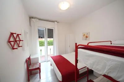 Letto o letti in una camera di Cozy flat with garden