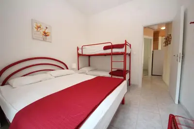 Letto o letti in una camera di Cozy flat with garden