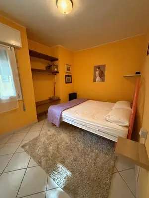 Letto o letti in una camera di Nice family villa in Rosolina Mare