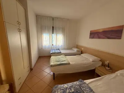 Letto o letti in una camera di Cozy flat with private parking in Rosolina Mare
