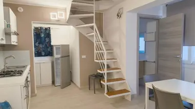 Cucina o angolo cottura di Renovated duplex in Rosolina