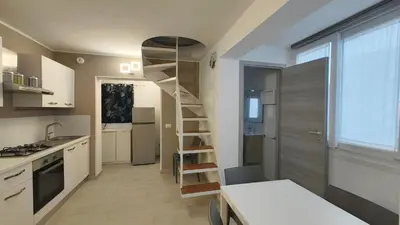 Cucina o angolo cottura di Renovated duplex in Rosolina