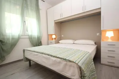 Letto o letti in una camera di Rosolina apartment with parking
